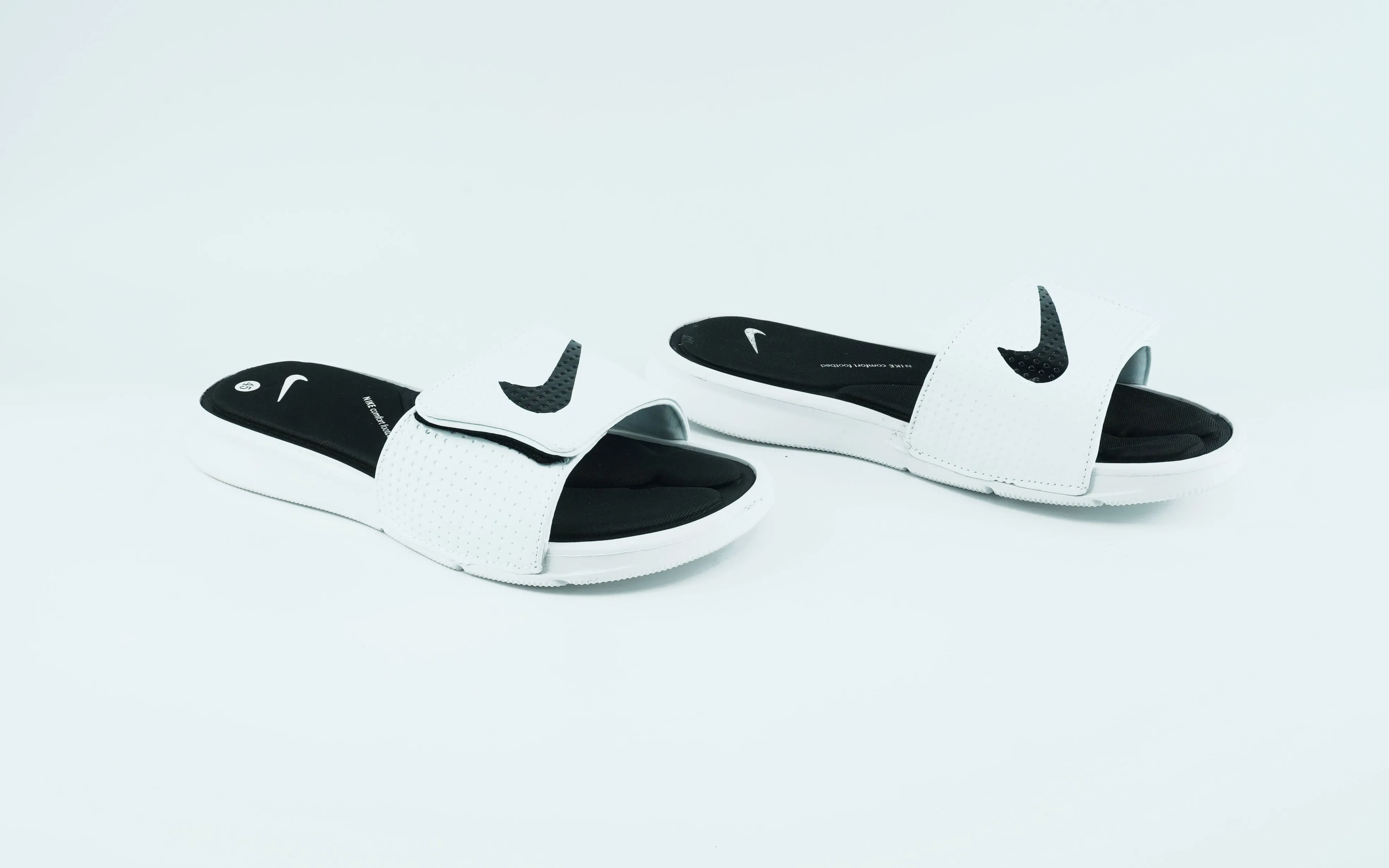 Nike white and black slides for men